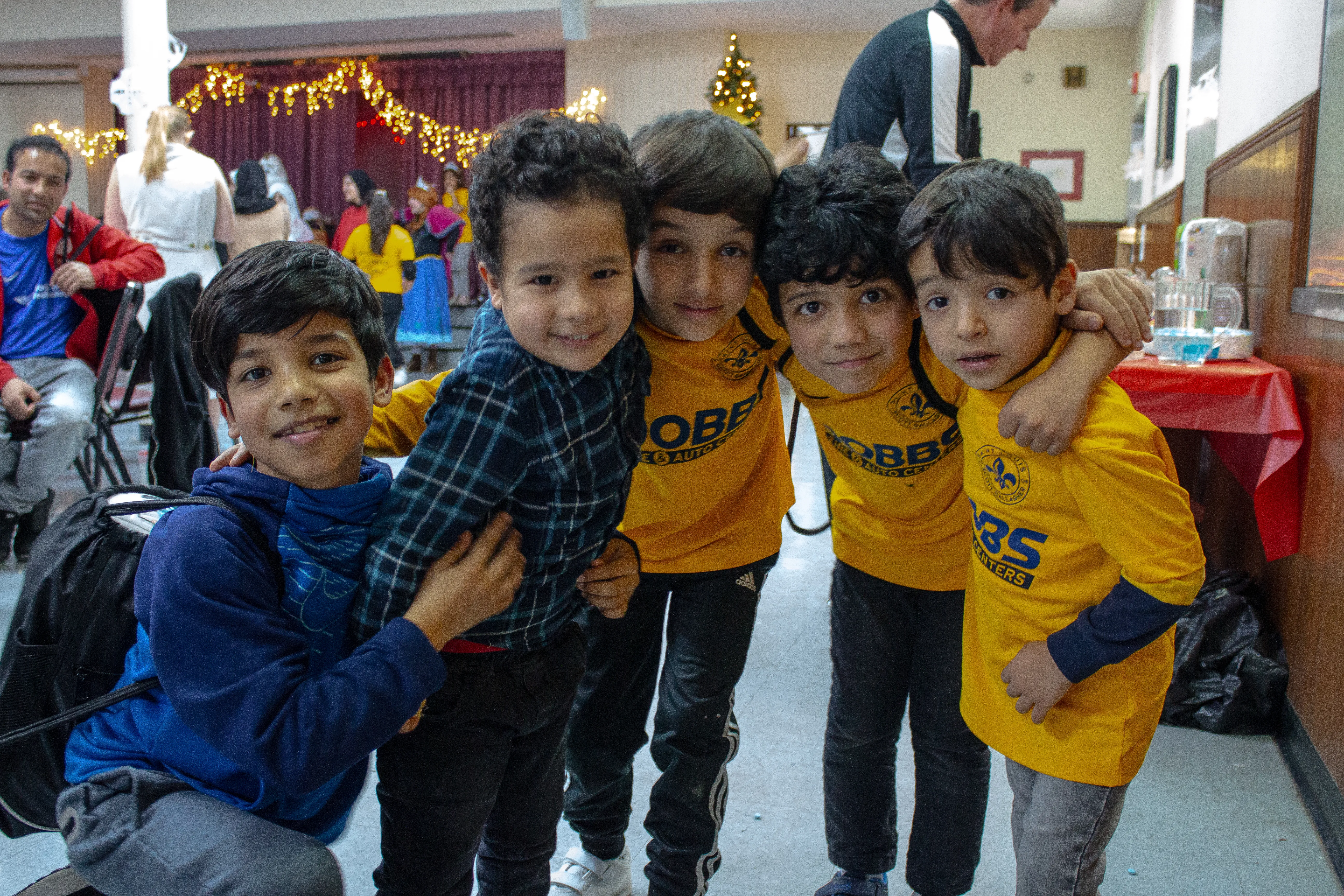 Children of Afghan immigrants to St. Louis play during a holiday party on Dec. 9, 2023.?w=200&h=150