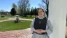 Mother Marla Marie stands on the front porch of the sisters’ Mother of the Light convent in Dartmouth, Massachusetts.