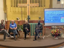 Panelists (from left) Rev. Dr. Jack Sullivan Jr., Debra Milke, and Randal Padgett at an Oct. 23, 2023, Catholic Mobilizing Network event at Xavier University’s Bellarmine Chapel in Cincinnati.