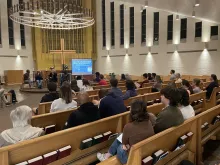 Panelists speak at an Oct. 23, 2023, Catholic-organized anti-death penalty event at Xavier University’s Bellarmine Chapel in Cincinnati.