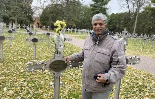 Patrick Norton stands near Sister Annella Zervas' grave, October 2022. Credit: Patti Armstrong