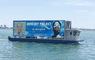 A portrait of Dr. Jorge Vallejo traveled on a boat around Miami as part of The Hero Art Project exhibit earlier this year. Courtesy of ARTHOUSE.NYC.