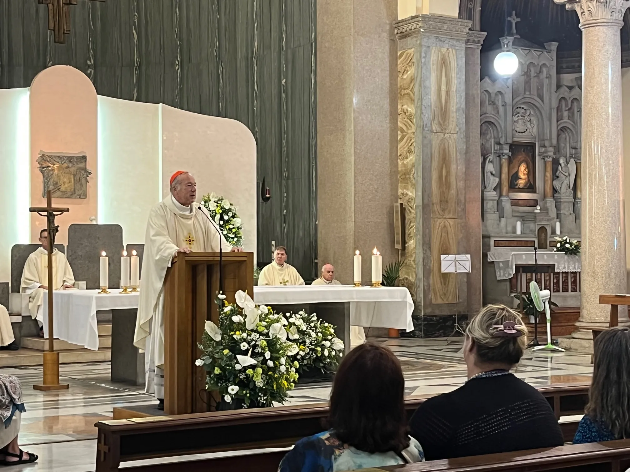 Cardinal Robert McElroy, bishop of San Diego, celebrates Mass at St. Patrick's Church in Rome Aug. 28, 2022.?w=200&h=150