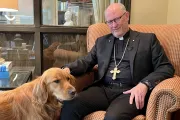 Bishop James Conley and his dog Stella