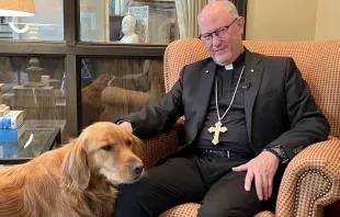 Bishop James Conley of the Diocese of Lincoln credits the support of friends, family, medical professionals, and his golden retriever, Stella, with his recovery from mental illness. Courtesy: Dennis Kellog