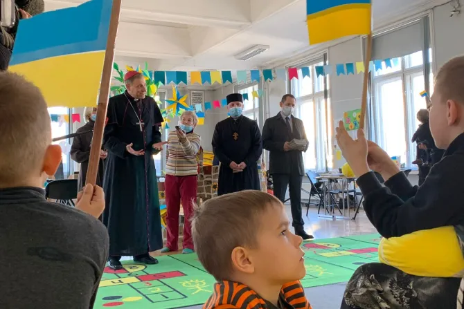 Archbishop Zbigņev Stankevičs of Riga visits Ukrainian refugees at the Registration Center for Ukrainians in Riga, Latvia, March 25, 2022.