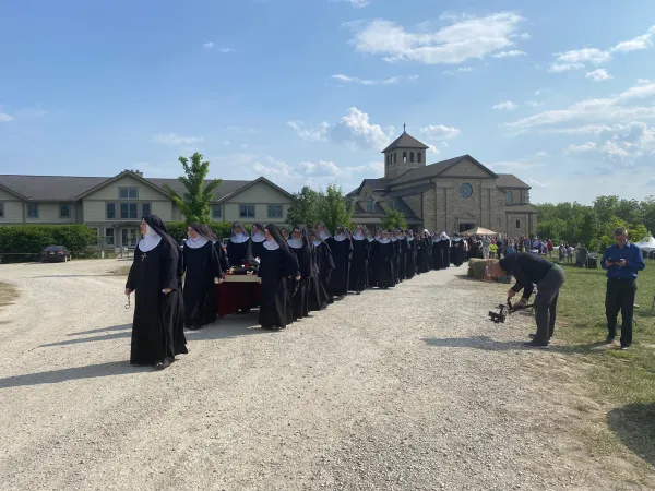Members of the Benedictines of Mary, Queen of Apostles, lead a procession with the body of their foundress, Sister Wilhelmina Lancaster, at their abbey in Gower, Missouri, on May 29, 2023. Joe Bukuras/CNA