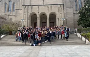 Students participating in the CEDE workshop for St. John's College High School gather for a group photo at the basilica at Catholic University of America in Washington, D.C., in November 2022. Credit: Photo courtesy of CUA