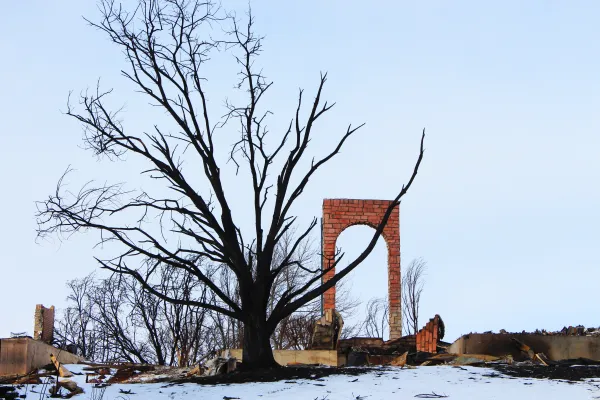 The brick archway of a ruined home near the corner of N McCaslin Blvd and Via Appia Way in Louisville, Colorado on Jan. 8, 2022. The fast-moving Marshall Fire consumed some 6,000 acres of land and 1,000 homes in Boulder County starting on Dec. 30, 2021. Jonah McKeown/CNA