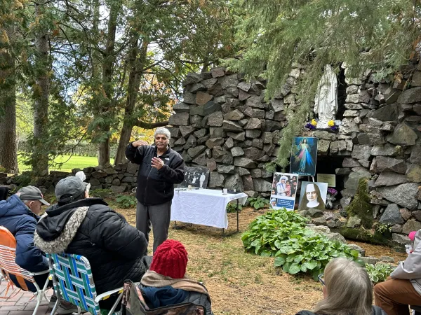Patrick Norton speaks during event at the grotto in the cemetery during event where the bishop's letter was read in October 2023. Credit: Patti Armstrong