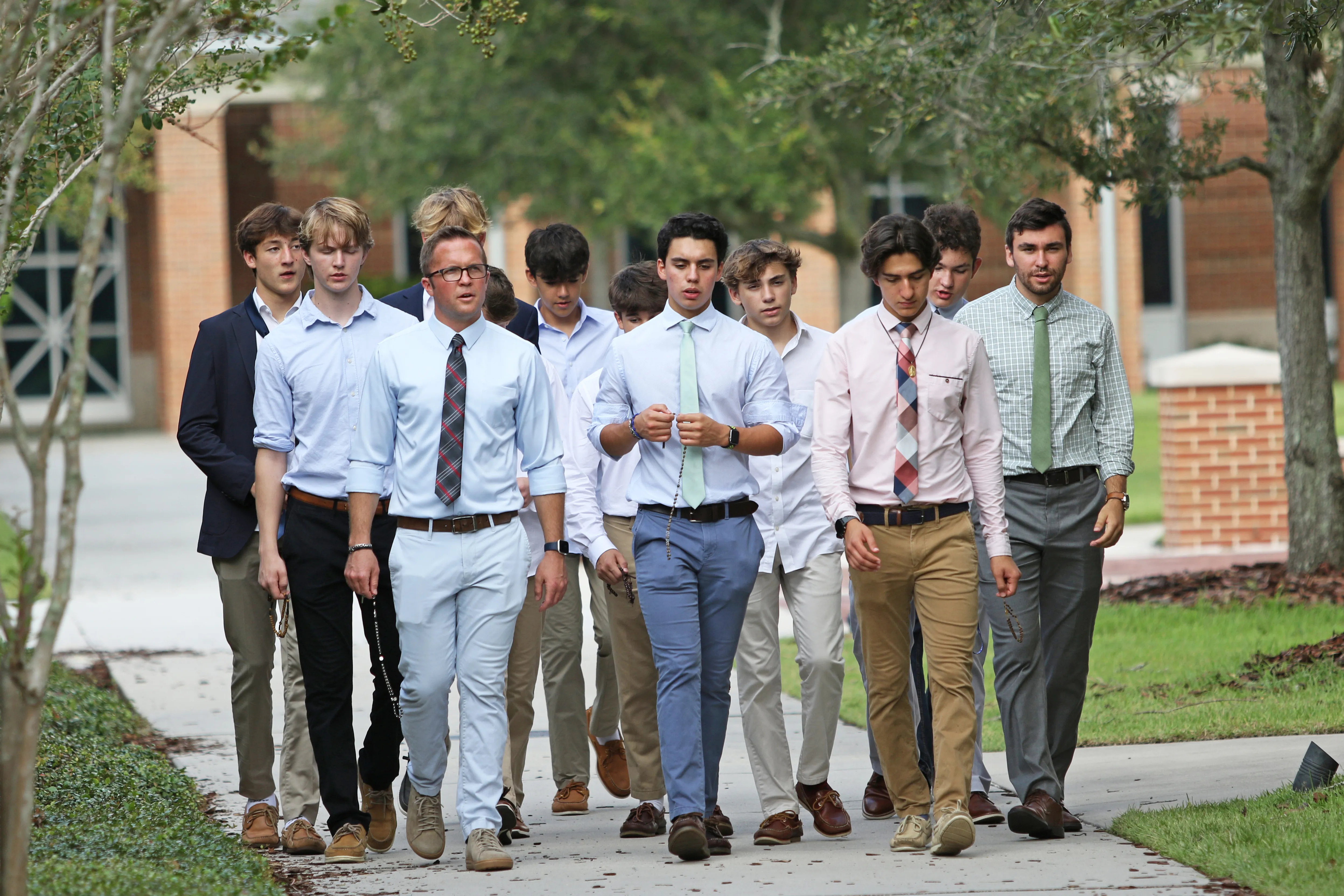 Jimmy Mitchell (front row, far left) leads a group of Jesuit High School students in Tampa, Florida, in a walking rosary after school.?w=200&h=150