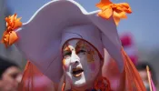 A member of The Sisters of Perpetual Indulgence marches with LGBTQ+ activists during the Los Angeles LGBT Center's "Drag March LA: The March on Santa Monica Boulevard," in West Hollywood, California, on Easter Sunday April 9, 2023.