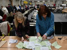 Votes are counted in Dublin, Ireland, on March 9, 2024, after voters in the country went to the polls March 8 to decide on a pair of referendums proposing wording changes to the Irish constitution aimed at reflecting secular values.