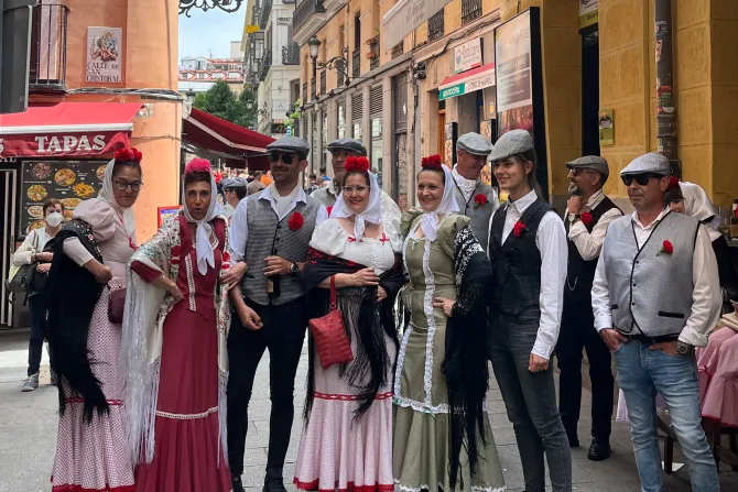 Many dressed up in Madrid’s traditional clothing, known as “traje de chulapa” in Spanish, which includes wearing a red carnation, for the feast of St. Isidore.