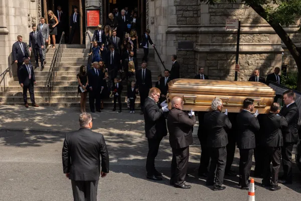 Former U.S. President Donald Trump, former U.S. First Lady Melania Trump, Ivanka Trump, Eric Trump, and other mourners look on as the remains of Ivana Trump are carried out from St. Vincent Ferrer Roman Catholic Church during her funeral service in New York, on July 20, 2022. Yuki Iwamura/AFP via Getty Images)
