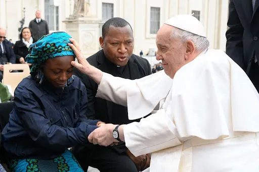 Janada Marcus with Pope Francis at the general audience on March 8, 2023.?w=200&h=150