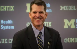 University of Michigan head coach Jim Harbaugh at his introductory press conference on Dec. 30, 2014. Eric Upchurch, CC BY-SA 4.0, via Wikimedia Commons