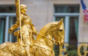 Side view of the gilded statue of Joan of Arc at Place des Pyramides in Paris, France. Shutterstock