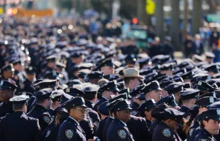 NYPD officers stand in line at the funeral of NYPD officer Jonathan Diller at St. Rose of Lima Catholic Church on March 30, 2024, in Massapequa, New York. Officer Diller was killed on March 25 when he was shot in Queens after approaching an illegally parked vehicle. Credit: Michael M. Santiago/Getty Images