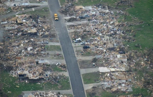 Damage in Joplin, Mo., several days after the 2011 tornado. Credit: Bob Webster via Flickr (CC BY 2.0).