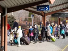 Refugees from Ukraine arrive at Przemyśl Główny train station in eastern Poland.