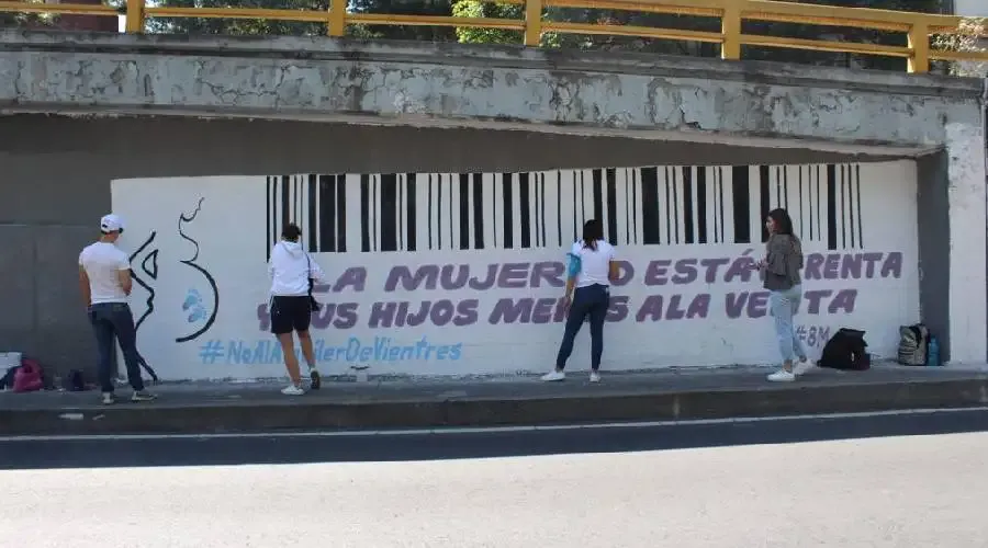 Young pro-life people paint a mural with messages opposing surrogate motherhood in Mexico.?w=200&h=150