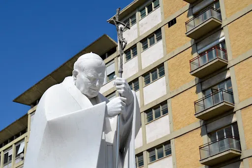 A large statue of St. John Paul II at the entrance of Rome’s Gemelli Hospital, where Pope Francis is recovering from surgery he underwent on June 7, 2023. Credit: Daniel Ibañez/CNA