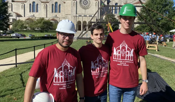 Architecture students Juan Soto, Andrew Masison, and Sam Merklein helped build a Notre-Dame de Paris truss replica that was raised at the Catholic University of America in Washington, D.C., on Sept. 26, 2022. Katie Yoder/CNA