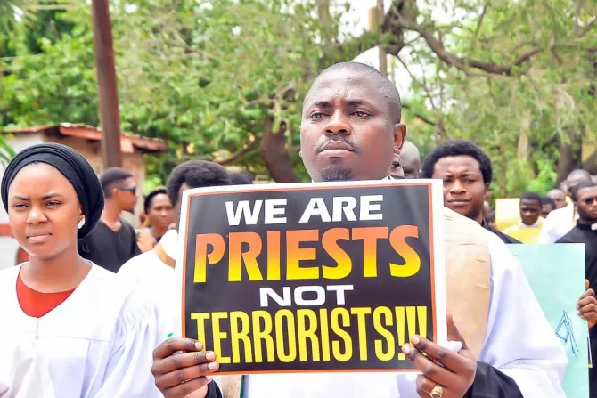 Priests protest at the funeral of Father Vitus Borogo in the archdiocese of Kaduna, Nigeria on June 30, 2022.
