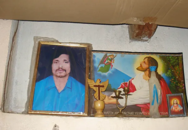 A photo of Kantheswar Digal, one of the 35 "martyrs of Kandahamal," hangs in his son's home in India. Credit: Anto Akkara