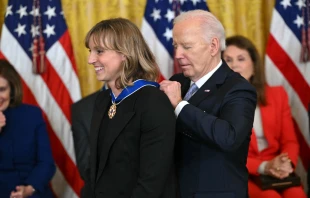 President Joe Biden presents the Presidential Medal of Freedom to U.S. swimmer Katie Ledecky in the East Room of the White House in Washington, D.C., on May 3, 2024. Credit: ANDREW CABALLERO-REYNOLDS/AFP via Getty Images