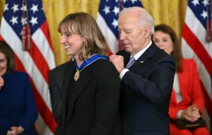 President Joe Biden presents the Presidential Medal of Freedom to U.S. swimmer Katie Ledecky in the East Room of the White House in Washington, D.C., on May 3, 2024. Credit: ANDREW CABALLERO-REYNOLDS/AFP via Getty Images