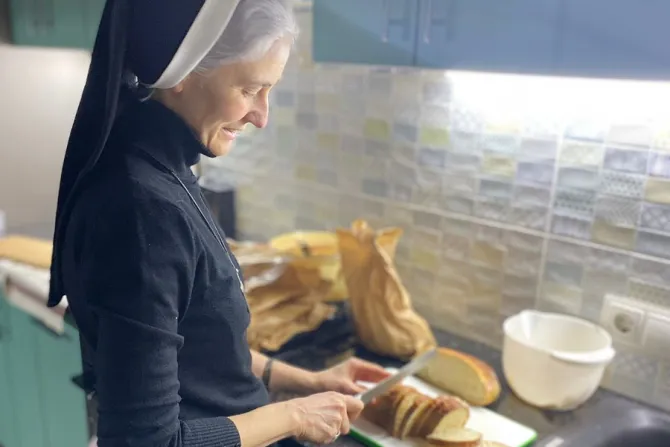 A religious sister prepares food for the civilian defenders of Kyiv, Ukraine.