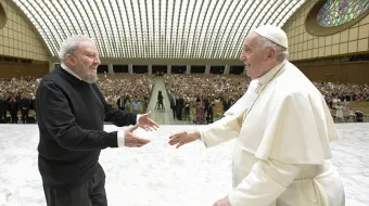 Pope Francis greets Kiko Argüello during a meeting with the Neocatechumenal Way in the Vatican's Paul VI Hall, June 27, 2022.