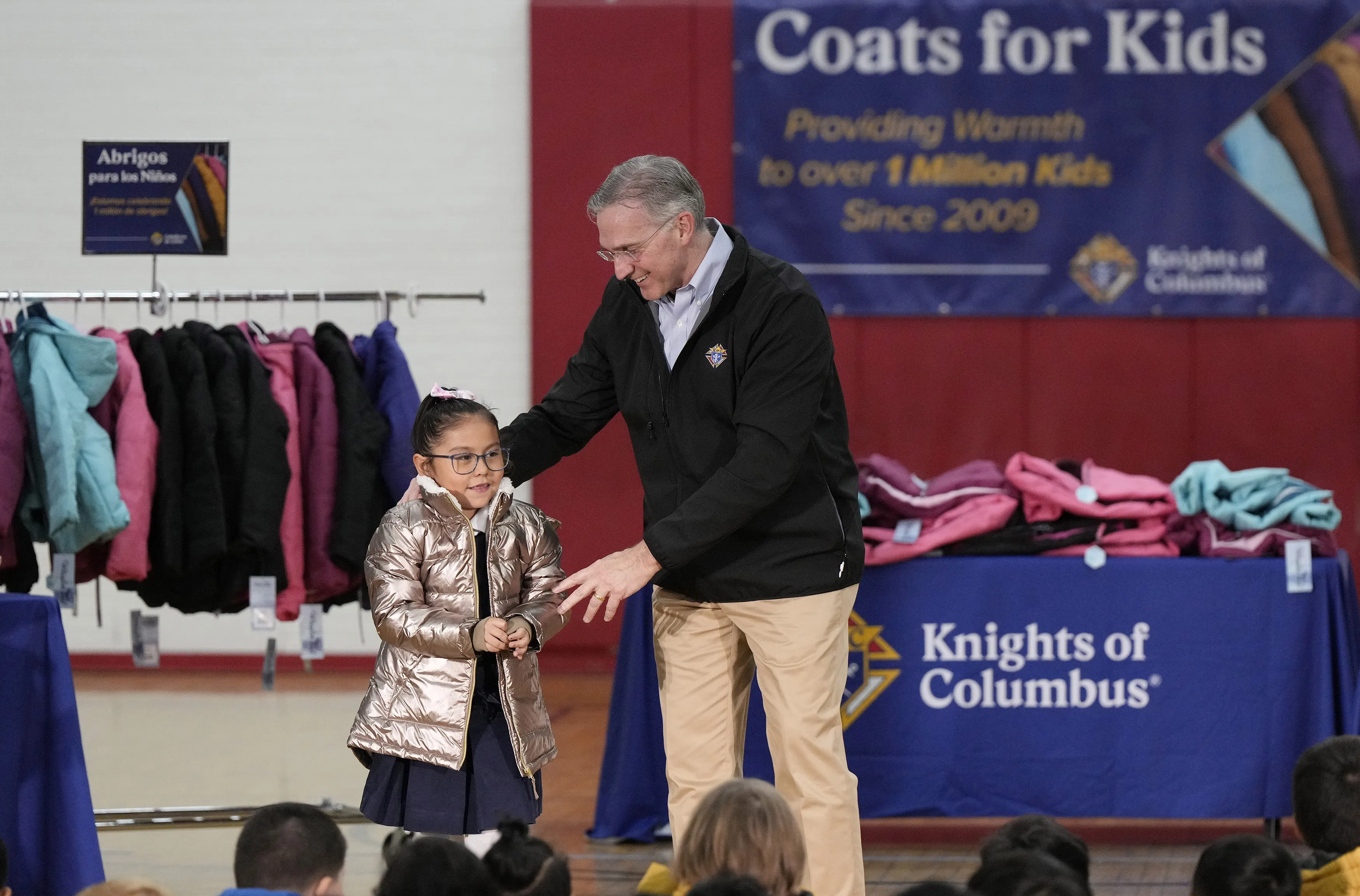 Supreme Knight Patrick Kelly gives the millionth coat to a little girl at Annunciation Catholic School in Denver, Colorado,?w=200&h=150