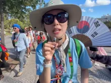 Justina, a young Korean woman who was recently baptized and entered the Catholic Church, explained that she decided to participate in World Youth Day 2023 in Lisbon “for many reasons. But I really wanted to see the pope.”