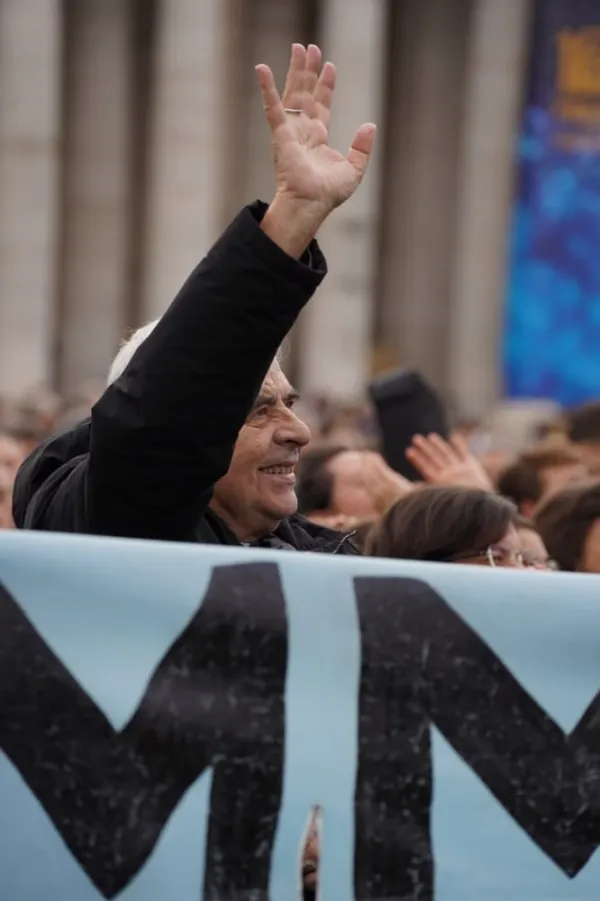 Father Giacomo Martinelli, founder of the House of Mary community, waves at Pope Francis during a recent Angelus in St. Peter's Square. Credit: Comunita Casa di Maria.