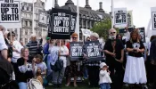 Representatives from the pro-life movement and their supporters gather to demonstrate in Parliament Square on May 15, 2024, in London.