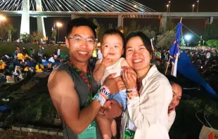 Luke and Tina Nguyen of Seattle with their 14-month-old son, Finn, after the prayer vigil with Pope Francis at Parque Tejo Aug. 5, 2023. The young family attended World Youth Day 2023 in Lisbon, Portugal. Hannah Brockhaus/CNA