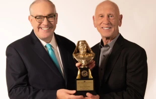 EWTN Chairman and Chief Executive Officer Michael P. Warsaw presents the 2022 Mother Angelica Award to former NFL star and coach Danny Abramowicz in honor of his lifetime of service to the new evangelization. Credit: EWTN