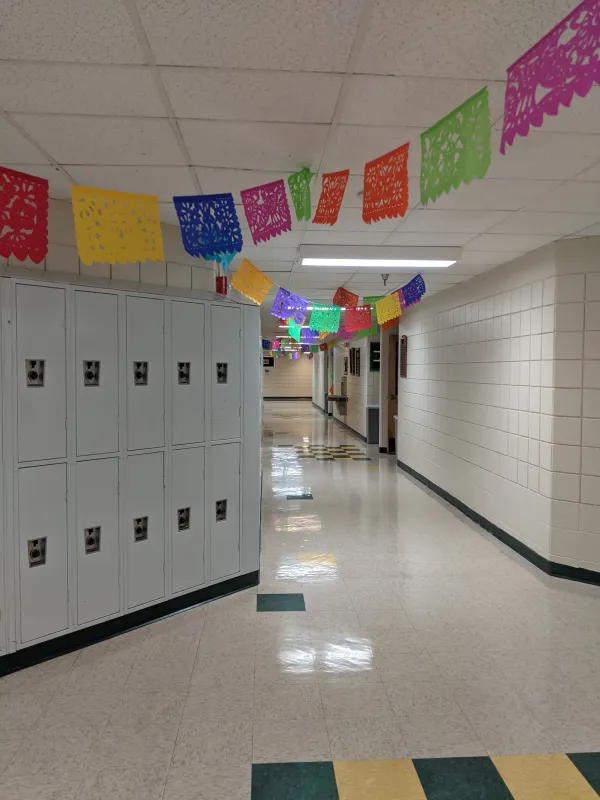 Hallways decorated with "papel picado" for the feast of Our Lady of Guadalupe at Bishop Machebeuf High School. Credit: Katherine Candler