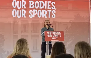 Madisan DeBos, a Division I track and cross country student-athlete at Southern Utah University, speaks at the "Our Bodies, Our Sports" rally in Washington, D.C., on June 23, 2022. Katie Yoder/CNA