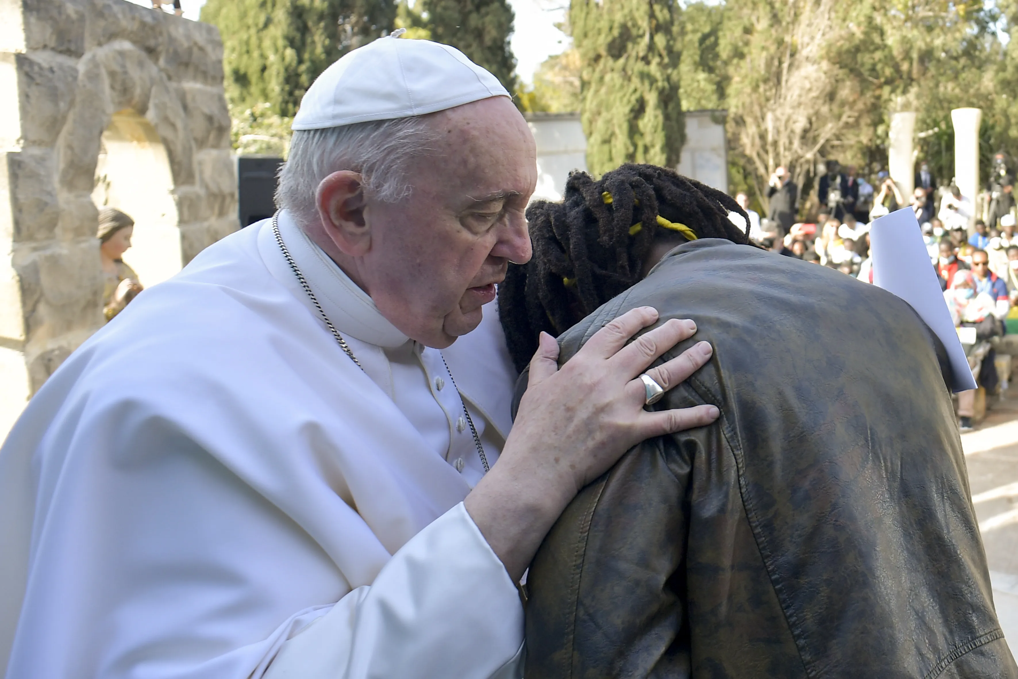 Pope Francis embraces Daniel Jude Oukeguale, who detailed his arduous journey of escaping Nigeria in an effort to be smuggled into Europe, during the pope's visit to an immigration reception center in Hal Far, Malta, on April 3, 2022.?w=200&h=150