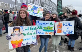 Young adults hold colorful signs outside the U.S. Supreme Court at the March for Life in Washington, D.C., on Jan. 21, 2022. Christine Rousselle/CNA