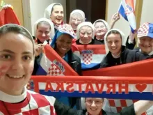 Sister Marija Zrno (on the left) and members of her community of nuns supporting Croatia at the 2022 World Cup.