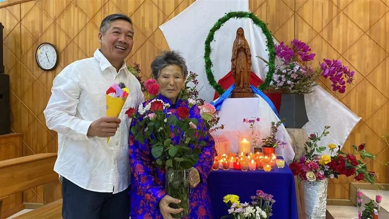 Father Andrew Tin Nguyen, parish priest of Mary Help of Christians in Darkhan, Mongolia, with Tsetsegee, who found a statue of the Blessed Mother in a landfill, which will be blessed by Pope Francis during his trip to Mongolia from Aug. 31–Sept. 4, 2023.?w=200&h=150