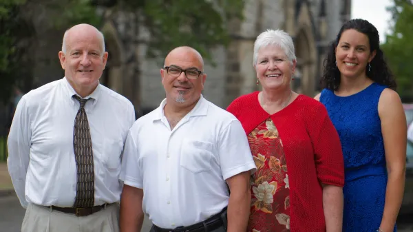 Detroit Mass Mob organizers, left to right, Thom Mann, Anthony Battaglia, the late Annamarie Barnes, and Teresa Chisholm stand outside St. Joseph Church in Detroit on June 29, 2014. Not pictured is organizer Jeff Stawasz. Photo courtesy of Detroit Catholic/Tim Hinkle