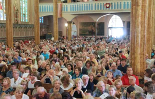 Massgoers fill St. Albertus Church in Detroit, Michigan, for Mass Mob V Aug. 10, 2014. The movement, which started in Buffalo in 2013 and quickly spread to other cities, found a lasting home in Detroit, which celebrated 51 events at historic city churches from 2014-19. Photo courtesy of Detroit Catholic/Jonathan Francis