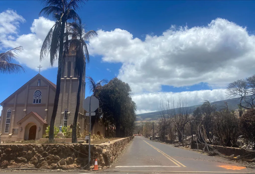 Burned houses are seen adjacent of Maria Lanakila Catholic Church on Aug. 11, 2023, in the aftermath of a wildfire in Lahaina, western Maui, Hawaii.?w=200&h=150