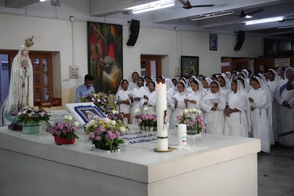Missionaries of Charity novices sing a hymn at the tomb of St. Teresa of Kolkata in the motherhouse in Kolkata, India, on the saint's feast day, Sept. 5, 2023. Credit: Anto Akkara